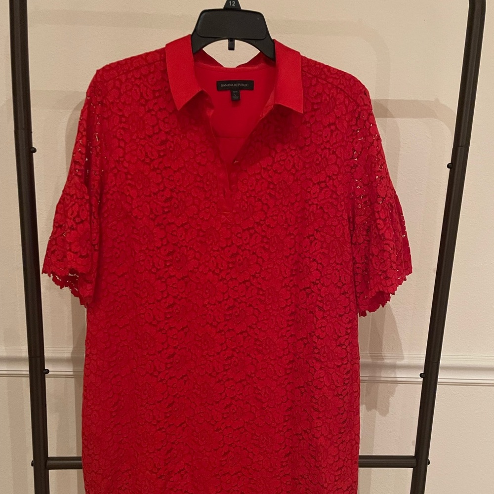 Red lace knee length dress for occasion wear. almost new in perfect condition.